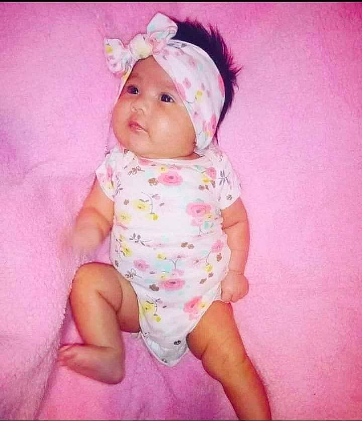 Aniya joined the competition — help win amazing prizes! baby, baby_toddler_clothing, cap, cheek, clothing, dress, eye, eyelash, happy, hat, headwear, iris, lip, magenta, nose, person, pink, purple, skin, sleeve