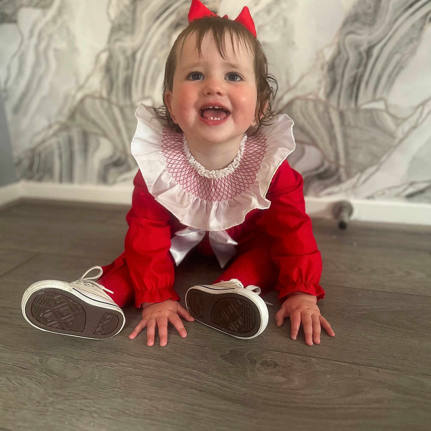 Lilly-Rose joined the competition — help win amazing prizes! background, bow, child, cute, face, feet, floor, hair, hands, happy, indoors, portrait, red_outfit, shoes, sitting, smiling, toddler, wallpaper, white_collar, wooden_floor