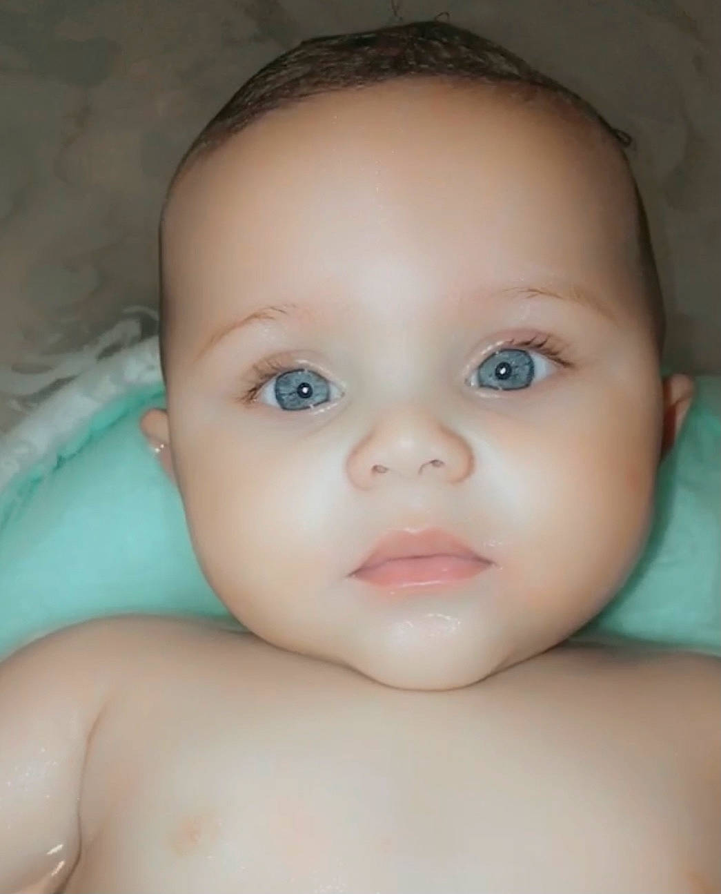 Amani joined the competition — help win amazing prizes! arm, baby, cheek, chest, ear, eye, eyelash, forehead, hair, hand, human_body, iris, lip, mouth, neck, no_expression, nose, person, skin, thumb