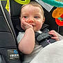 Athena joined the competition — help win amazing prizes! baby, car_seat, child, infant, smiling, hand, face, toy, colorful, blanket, clothing, seatbelt, graco, closeup, happy, person, cute, indoors, head, expression