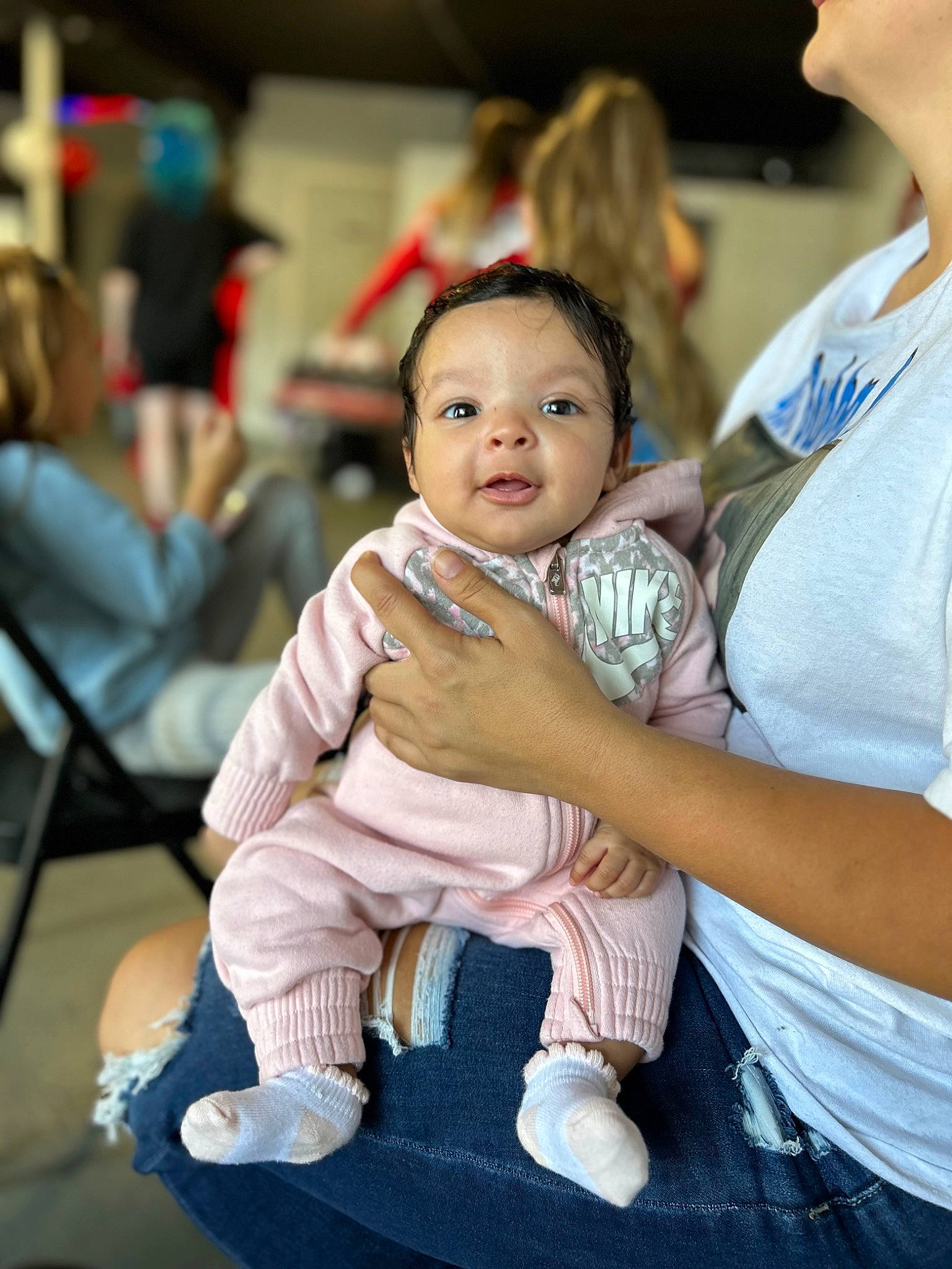 Kanylah is registered to the contest to win money with this photo: baby, cheek, child, event, flooring, fun, fur, gesture, happy, leisure, mammal, person, sitting, skin, toddler, vacation, vertebrate