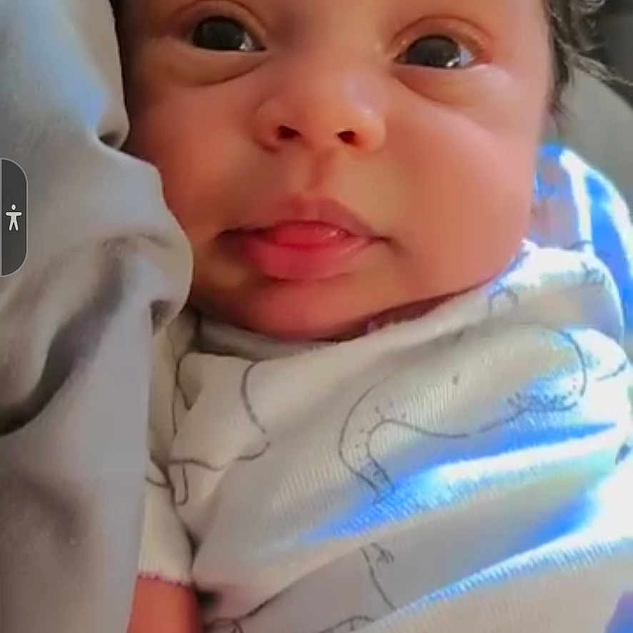 Gabriella'Monroe joined the competition — help win amazing prizes! baby, blanket, child, closeup, comfort, cozy, cute, expression, eyes, face, head, indoors, infant, newborn, person, portrait, skin, sleepwear, soft, swaddled