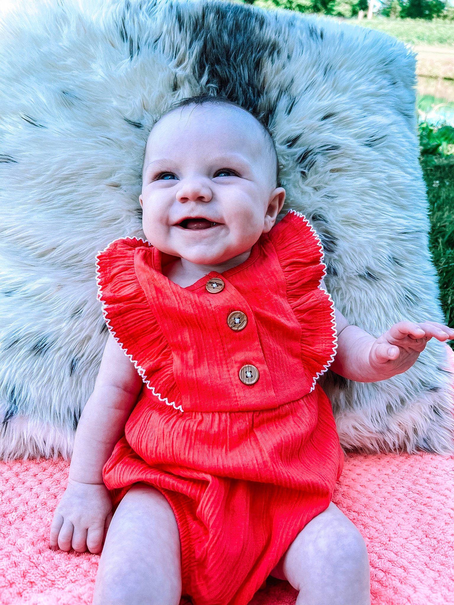 Braelynn joined the competition — help win amazing prizes! baby, baby_toddler_clothing, child, dress, eye, fun, fur, grass, happy, human_body, magenta, pattern, person, pink, sitting, skin, sleeve, smile, textile, toddler