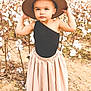 beachwear, child, clothing, cotton, dress, face, female, flower, girl, happy, hat, head, person, photography, plant, portrait, skirt, sleeve, smile, sunhat
