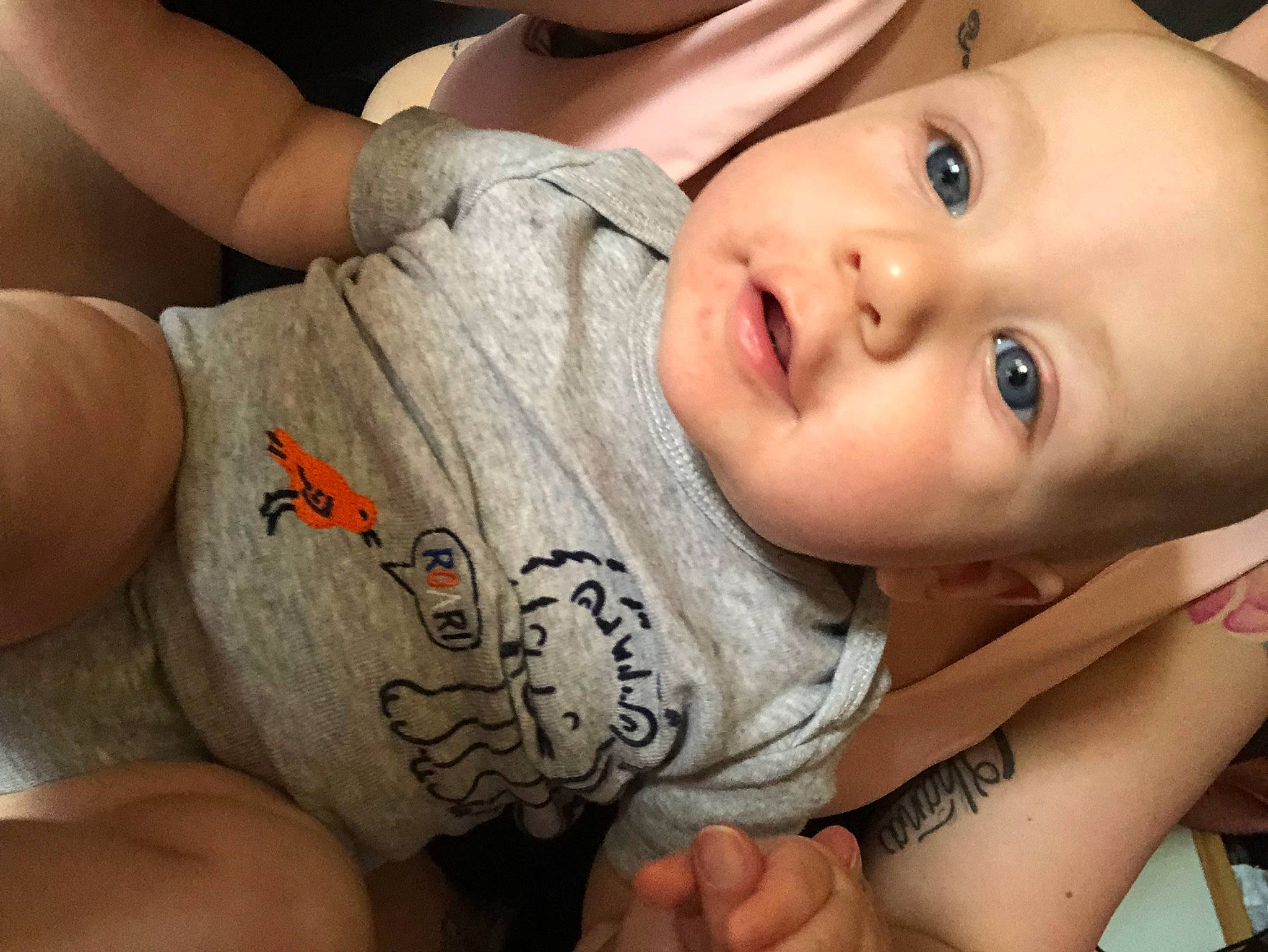 Julien is registered to the contest to win money with this photo: arm, baby, cheek, child, chin, eye, eyebrow, face, finger, forehead, hand, head, lip, mouth, muscle, nail, nose, person, skin, thumb