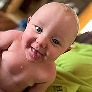 Oliver is registered to the contest to win money with this photo: baby, tongue, face, skin, eyes, cheeky, closeup, expression, infant, child, portrait, cute, mischievous, smile, indoors, human, head, person, young, happy