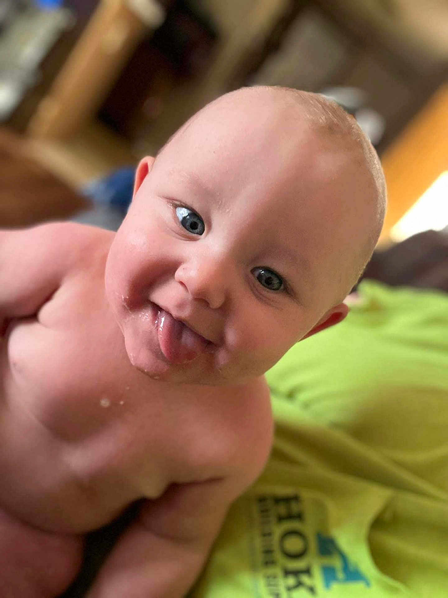 Oliver is registered to the contest to win money with this photo: baby, tongue, face, skin, eyes, cheeky, closeup, expression, infant, child, portrait, cute, mischievous, smile, indoors, human, head, person, young, happy