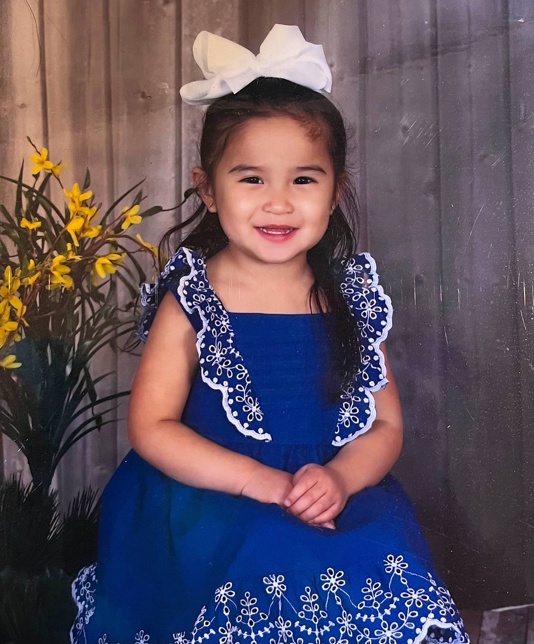 Josephine is registered to the contest to win money with this photo: beauty, day_dress, dress, electric_blue, flash_photography, flower, formal_wear, happy, hat, head, headpiece, iris, joy, one_piece_garment, person, plant, purple, sleeve, smile, standing