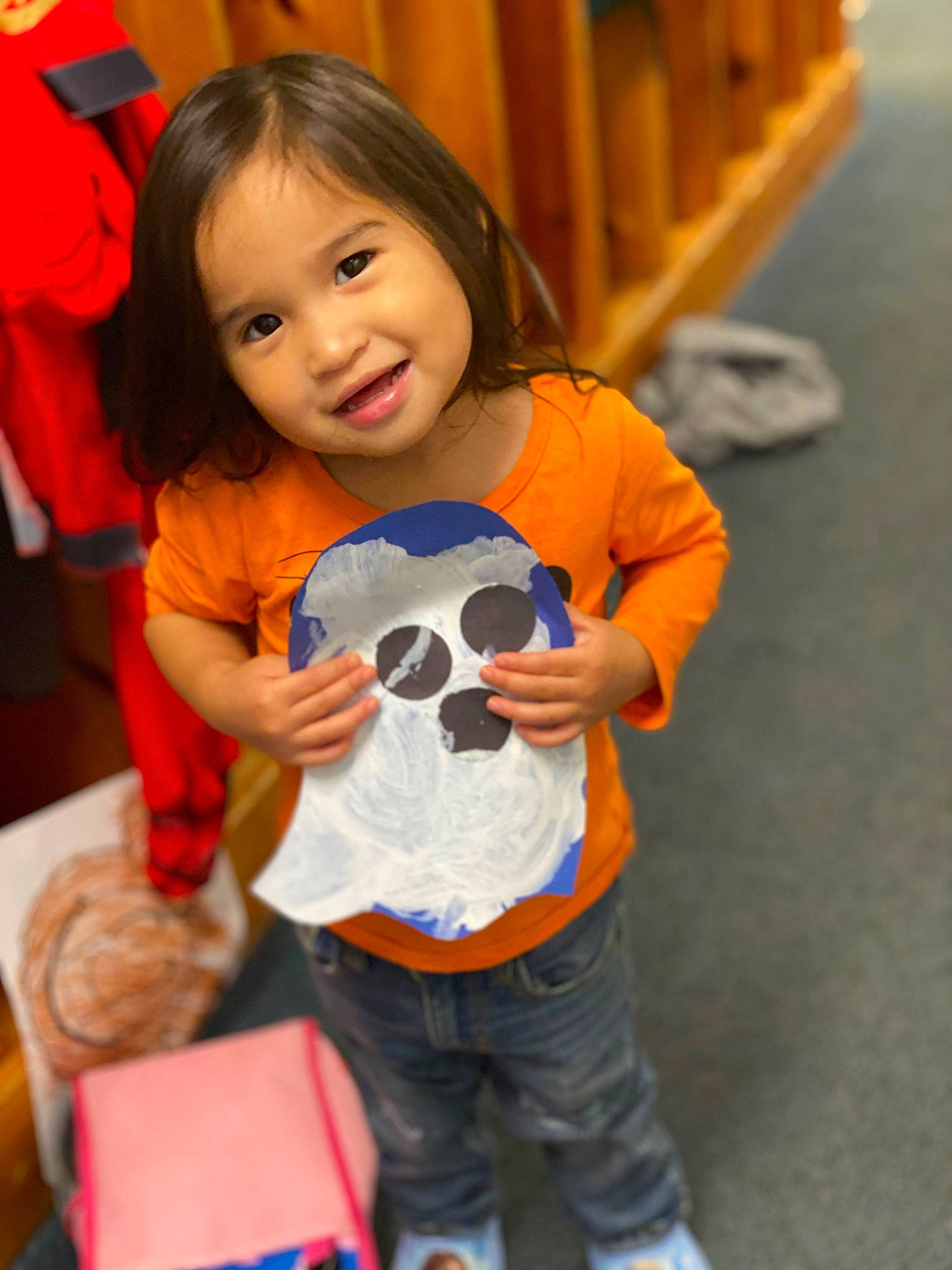 Josephine is registered to the contest to win money with this photo: baby_playing_with_toys, baby_toddler_clothing, child, event, flooring, fun, happy, joy, leisure, orange, party, person, room, sleeve, smile, sneakers, t_shirt, toddler, toy, vertebrate