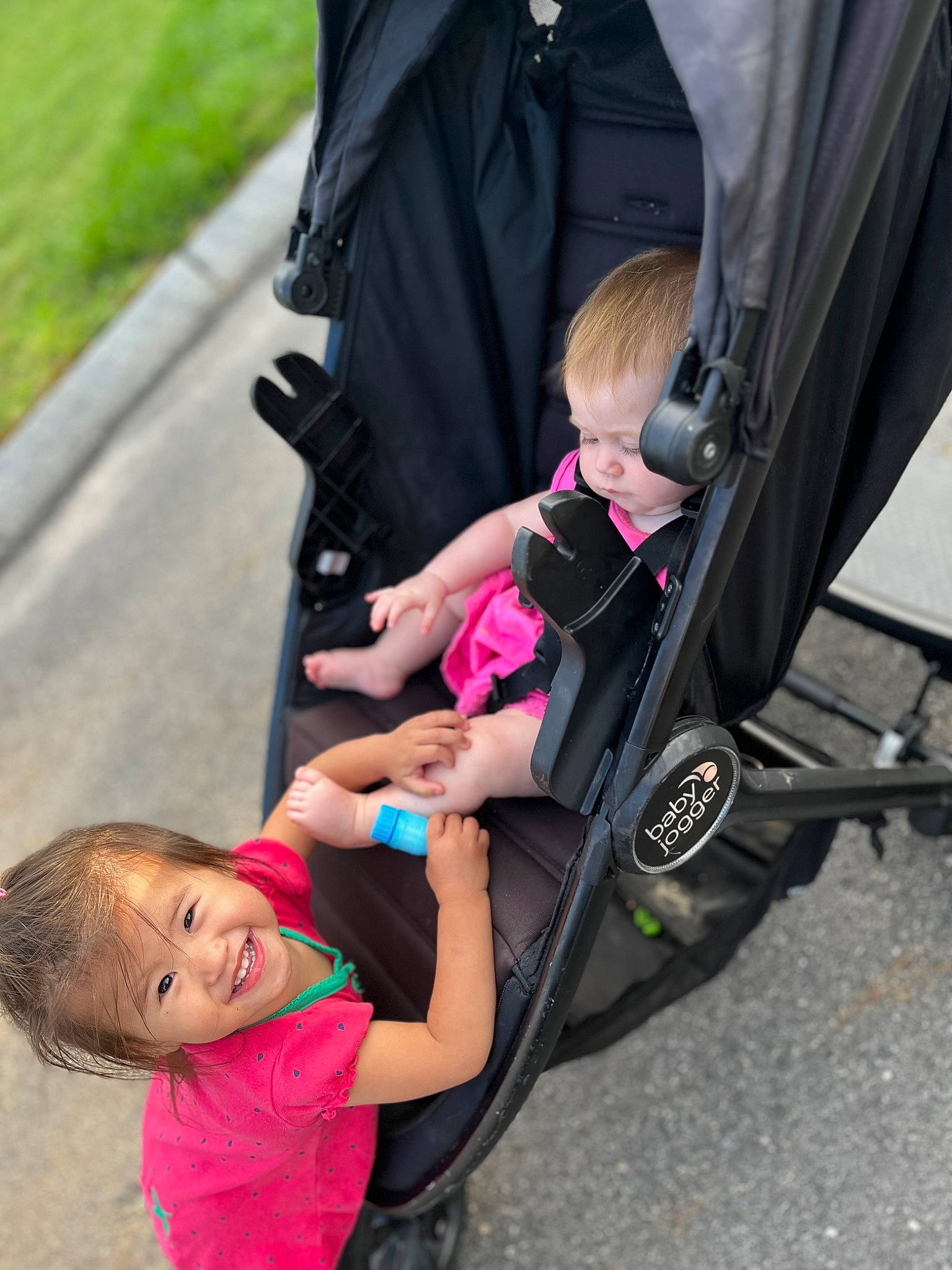 Peyton joined the competition — help win amazing prizes! baby, baby_carriage, baby_products, child, comfort, event, fun, grass, joint, joy, lap, leaf, leisure, magenta, person, plant, product, recreation, sitting, tire