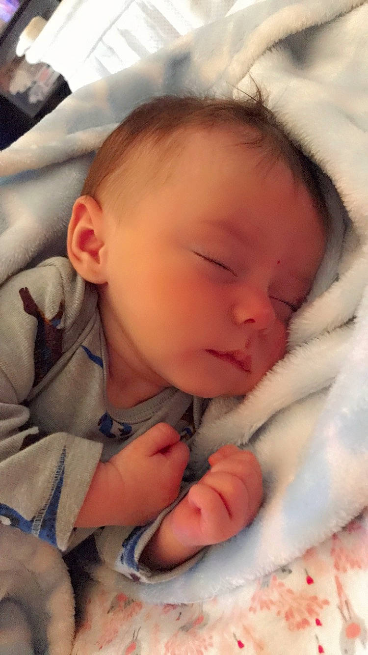 Adley is registered to the contest to win money with this photo: baby_sleeping, baby_toddler_clothing, cheek, chin, comfort, ear, eye, eyebrow, face, facial_expression, gesture, head, iris, lip, mouth, nose, person, product, skin, textile