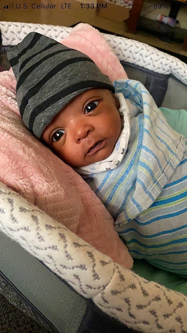 Messiah joined the competition — help win amazing prizes! baby, baby_products, baby_safety, beanie, bedding, cap, cheek, child, comfort, eye, eyebrow, happy, headwear, knit_cap, linens, person, room, skin, smile, textile