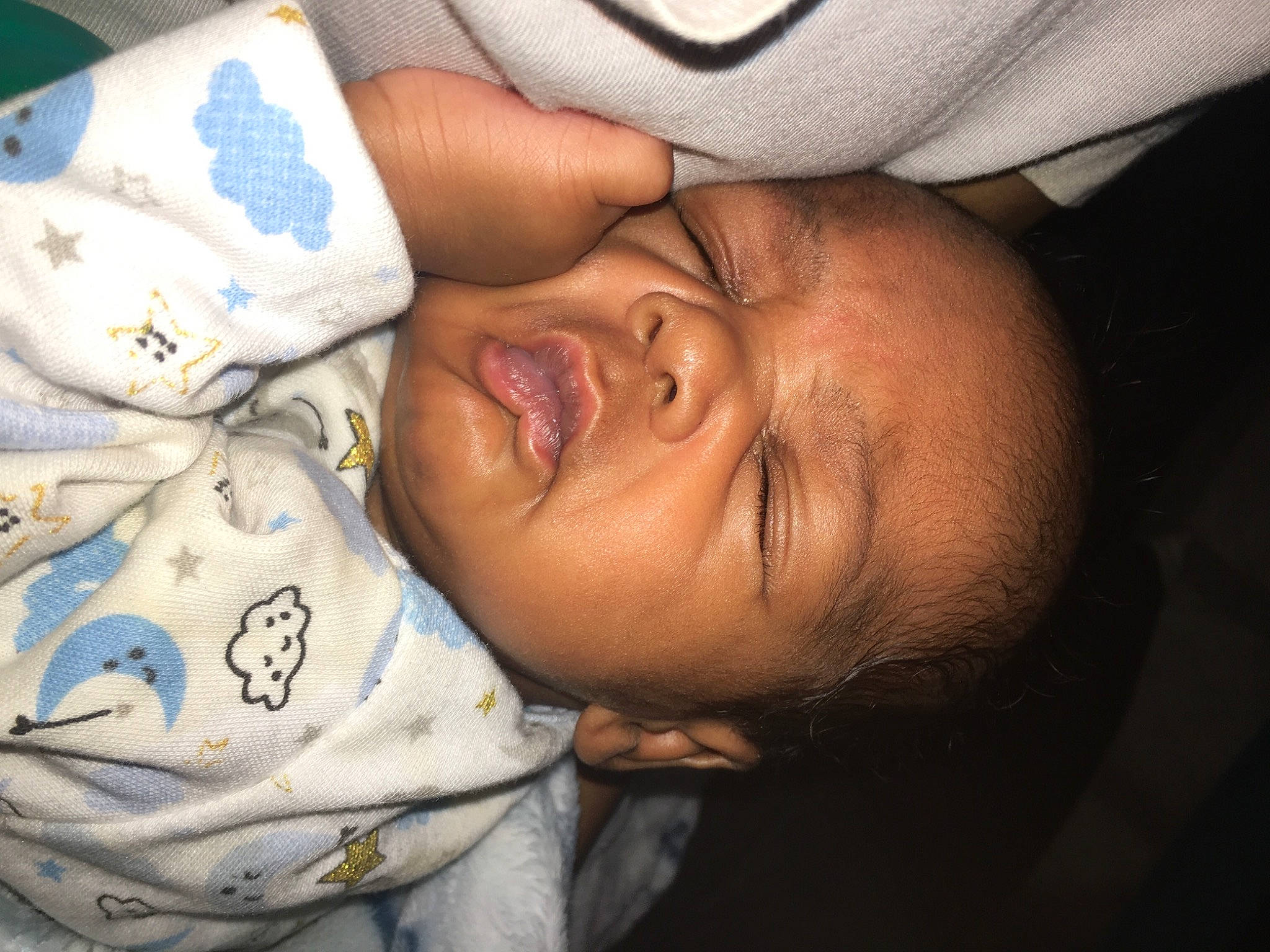 Messiah is registered to the contest to win money with this photo: abdomen, baby, baby_products, baby_sleeping, bedtime, cheek, child, comfort, elbow, eyelash, happy, hat, headgear, human_body, linens, nap, nose, person, skin, toddler