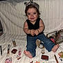 baby, child, smiling, headband, jeans, makeup, perfume, cosmetics, blanket, sitting, foot, hand, face, indoor, cute, accessories, decor, pink, toy, portrait