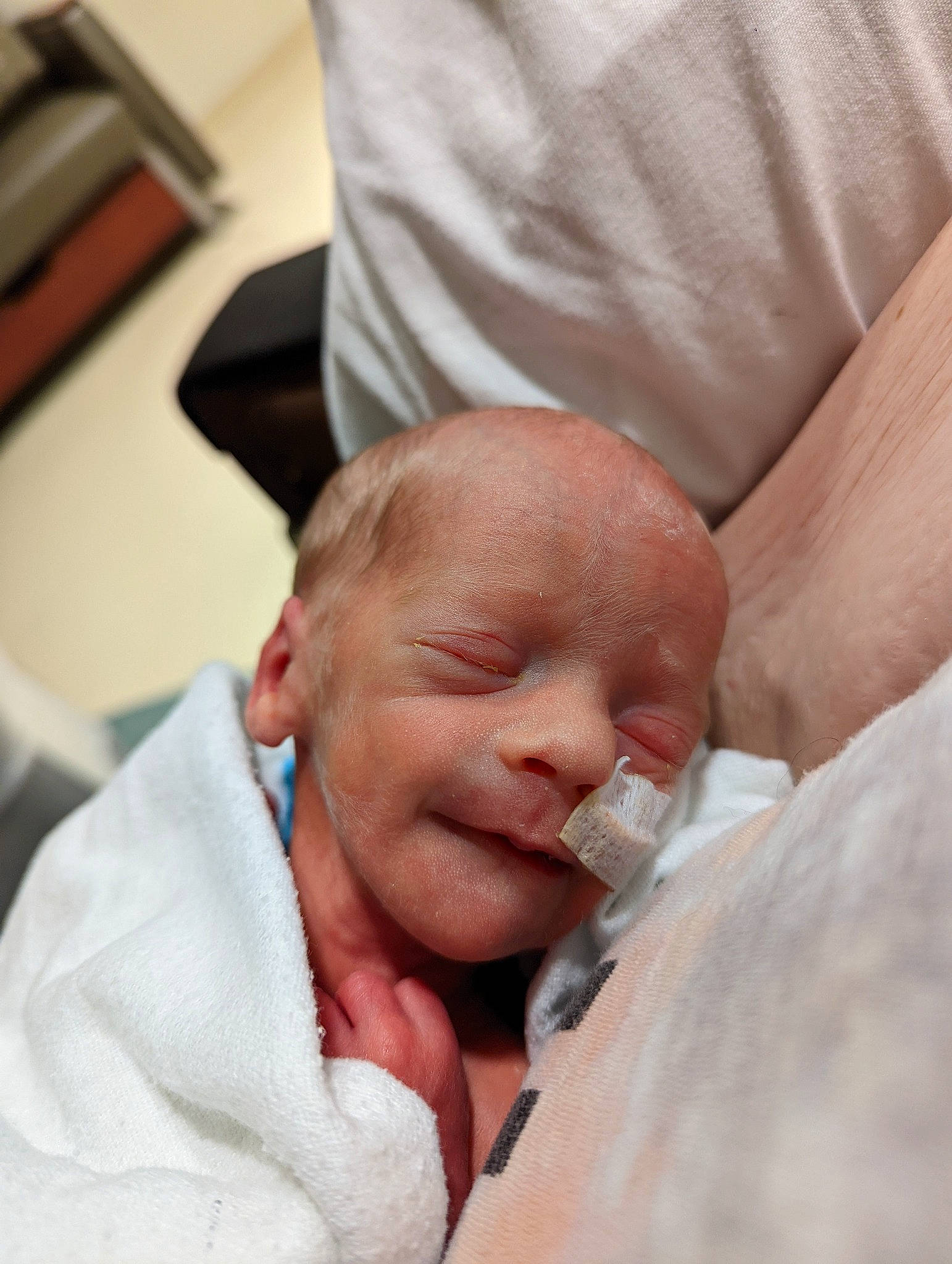 Alaric is registered to the contest to win money with this photo: baby, baby_products, cheek, child, childbirth, comfort, drinkware, ear, event, eyebrow, eyelash, gesture, head, hospital, nose, patient, person, service, thumb, toddler