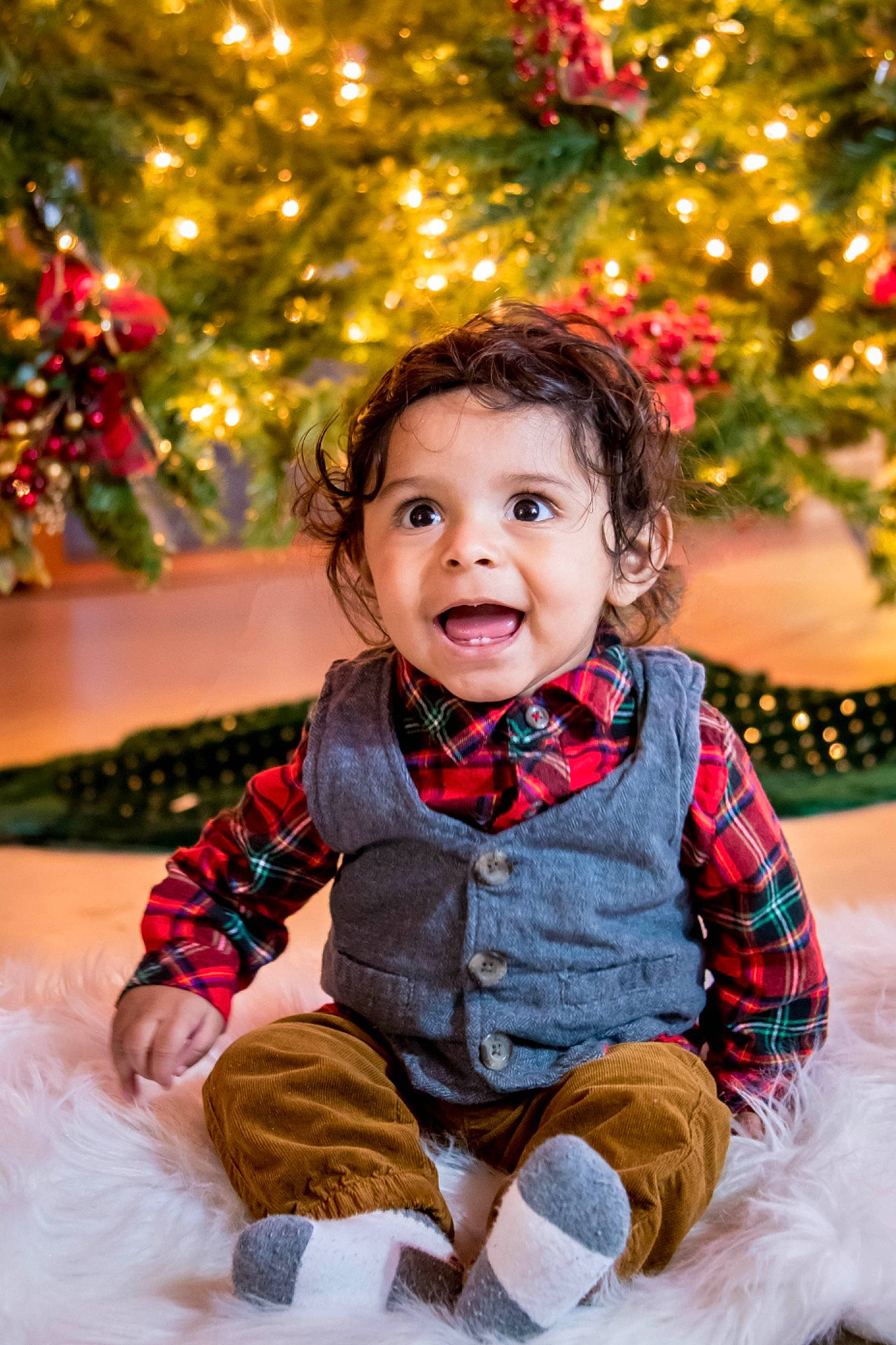 Amarion is registered to the contest to win money with this photo: baby, child, christmas, christmas_decoration, christmas_eve, christmas_ornament, christmas_tree, event, fir, happy, holiday, person, photography, plant, portrait_photography, shortstraw_pine, sitting, smile, toddler, tradition