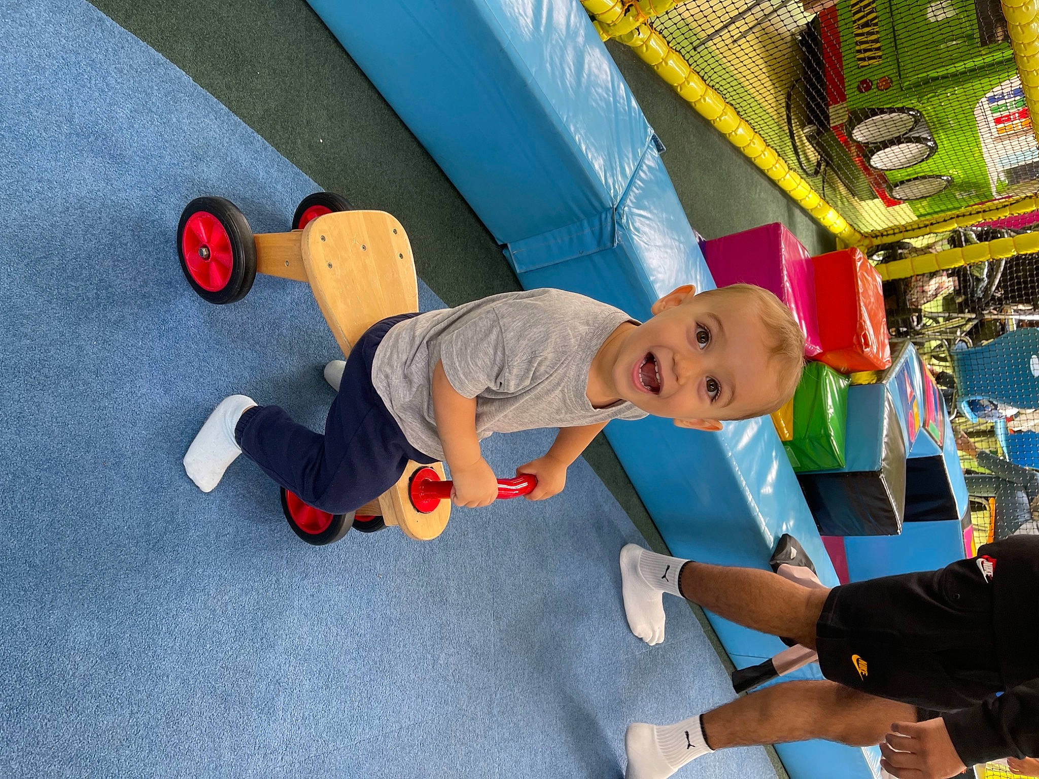 Nektarios is registered to the contest to win money with this photo: baby, child, chute, city, flooring, fun, leisure, outdoor_play_equipment, person, physical_fitness, play, playground, recreation, room, sneakers, standing, t_shirt, toddler