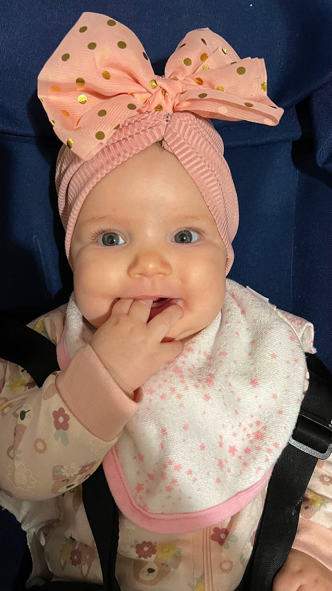 Amaia is registered to the contest to win money with this photo: baby, baby_toddler_clothing, cap, cheek, child, costume_hat, creative_arts, fashion_accessory, hair_accessory, happy, headband, headgear, headpiece, headwear, pattern, peach, person, pink, skin, sleeve