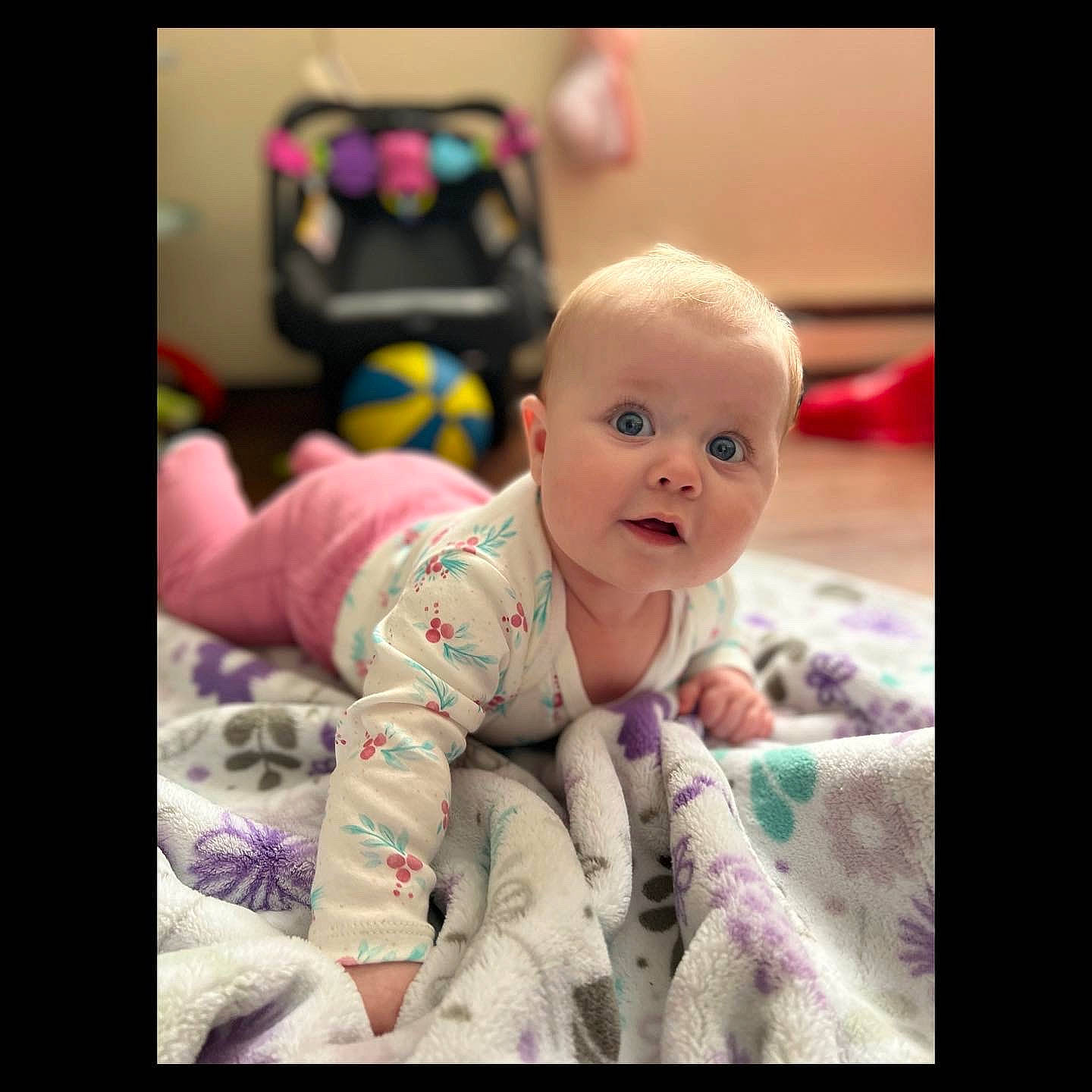 Bexleigh joined the competition — help win amazing prizes! baby, baby_products, baby_toddler_clothing, cheek, child, comfort, flash_photography, flooring, fun, happy, person, portrait_photography, product, room, sitting, skin, sleeve, smile, surprise, toddler