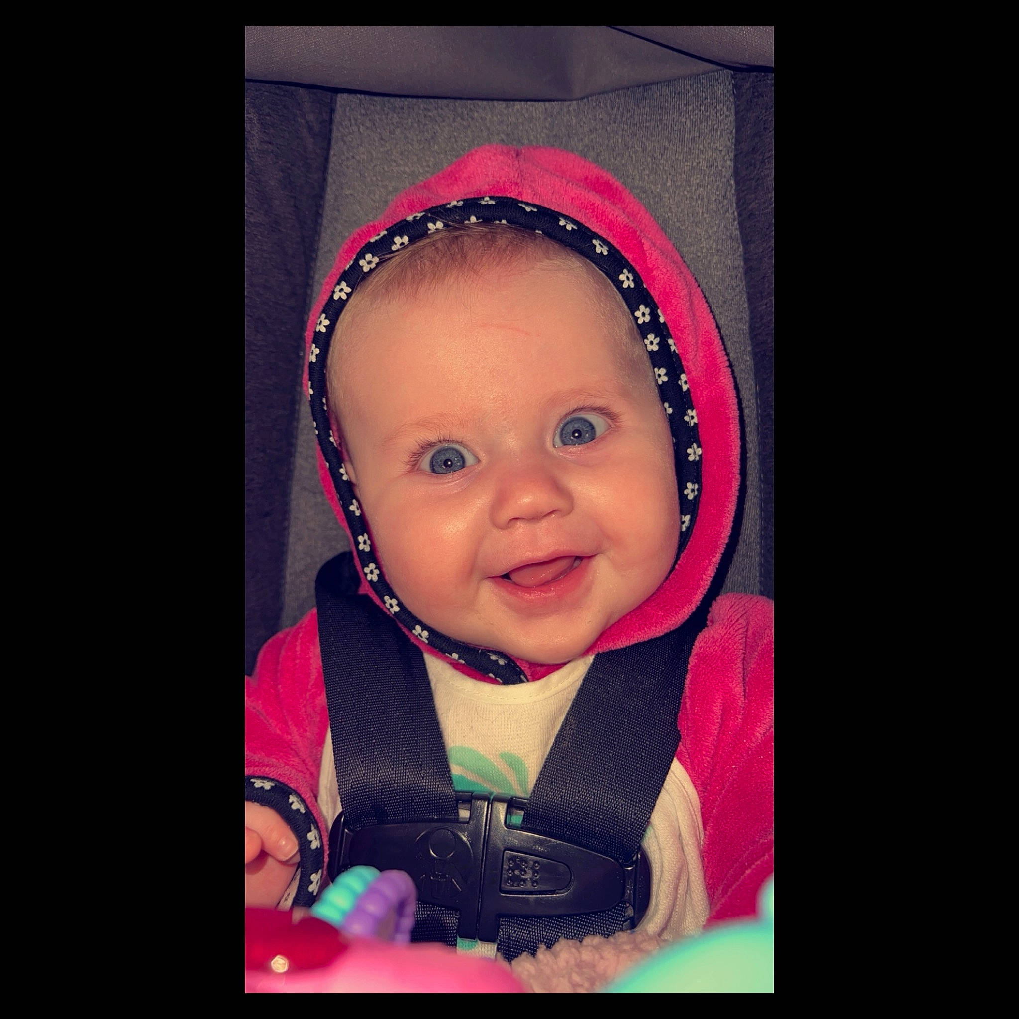 Bexleigh is registered to the contest to win money with this photo: baby, baby_toddler_clothing, cloud, cool, ear, eyebrow, facial_expression, flash_photography, happy, human_body, iris, mouth, nose, outerwear, person, pink, purple, sleeve, smile, toddler
