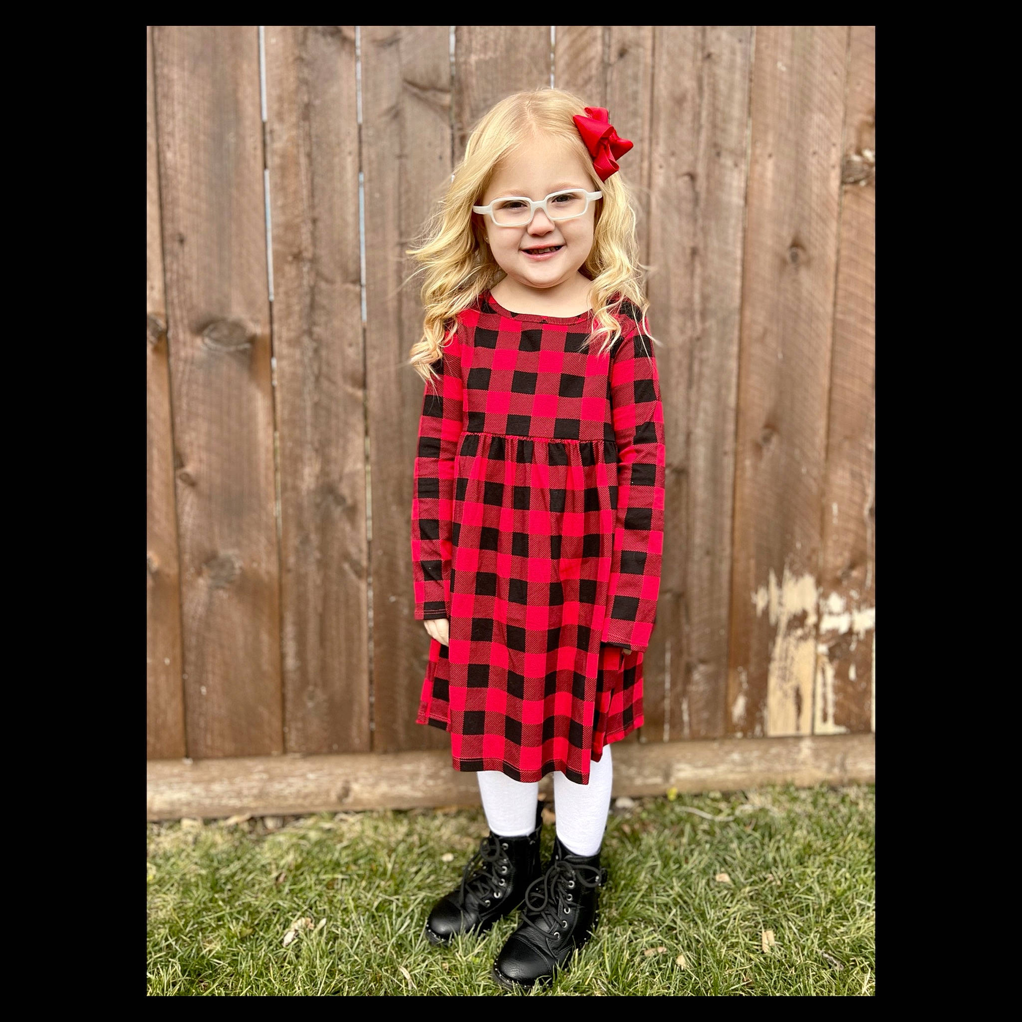 Journee is registered to the contest to win money with this photo: day_dress, dress, eye, fashion_design, flash_photography, formal_wear, grass, happy, human_body, joy, knee, one_piece_garment, pattern, people_in_nature, person, plant, sleeve, street_fashion, textile, toddler