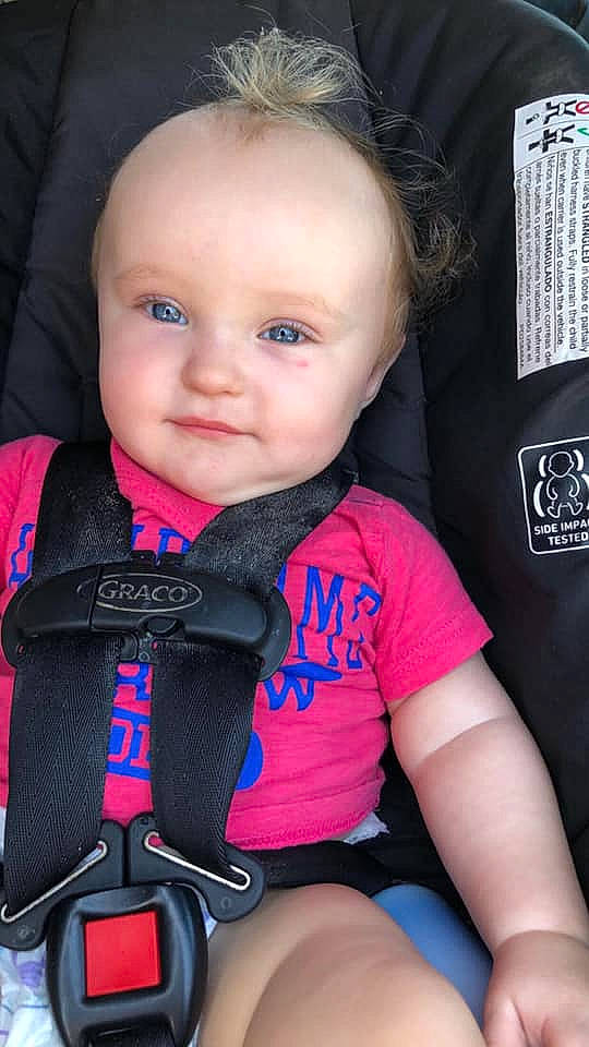 Ernest is registered to the contest to win money with this photo: auto_part, baby, baby_carriage, baby_in_car_seat, baby_products, car_seat, cheek, child, child_model, person, pink, product, seat_belt, sitting, skin, toddler