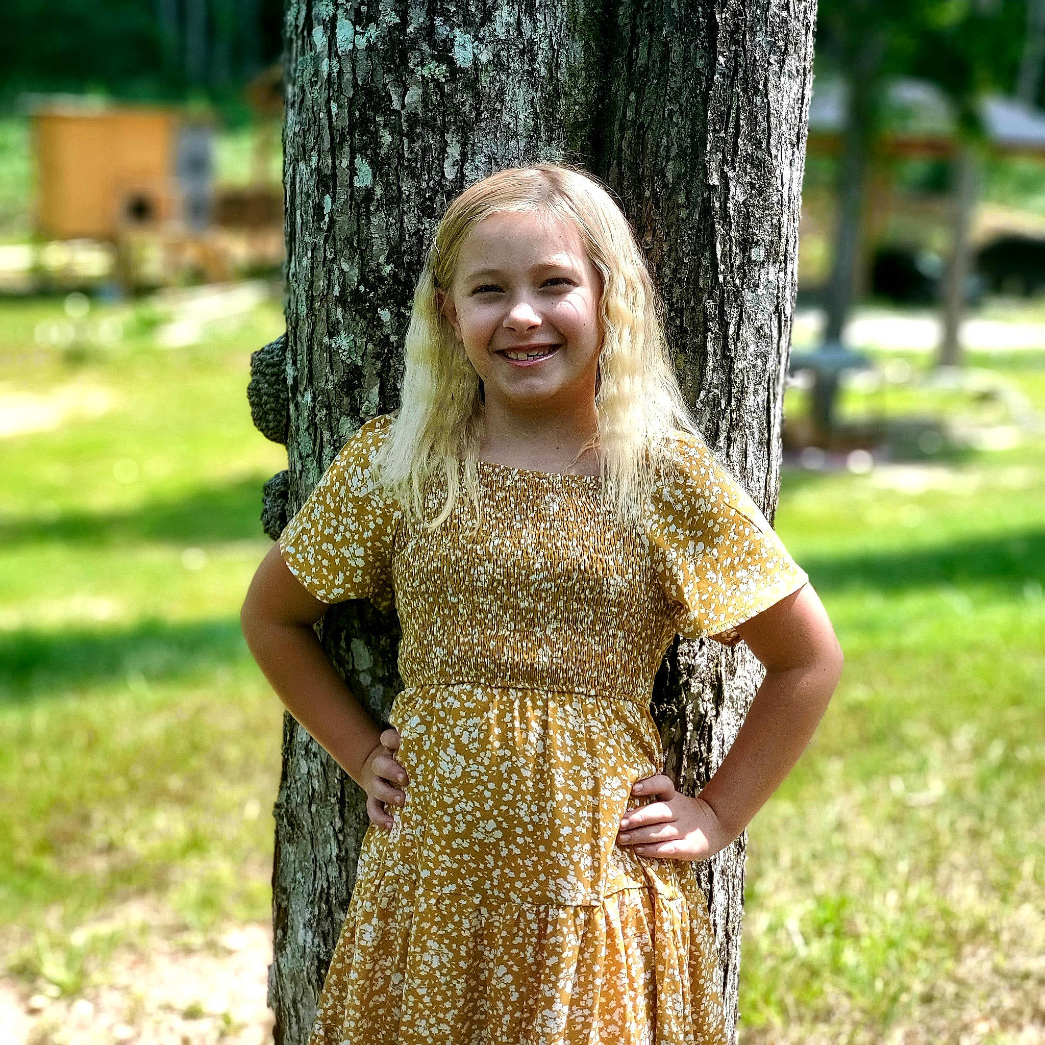 Megan is registered to the contest to win money with this photo: botany, day_dress, dress, fawn, grass, grass_family, hair, happy, joy, long_hair, one_piece_garment, people_in_nature, person, plant, shoulder, smile, street_fashion, tree, trunk, waist
