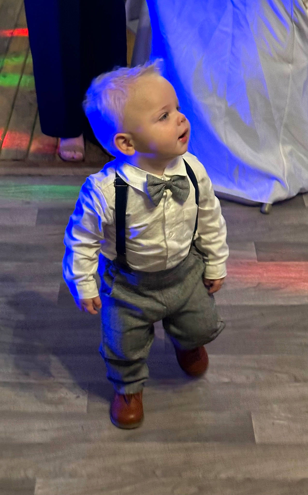 Brantley is registered to the contest to win money with this photo: baby, baby_toddler_clothing, child, costume, electric_blue, fictional_character, floor, flooring, fun, gesture, happy, hat, leisure, person, personal_protective_equipment, sitting, sleeve, toddler, wood