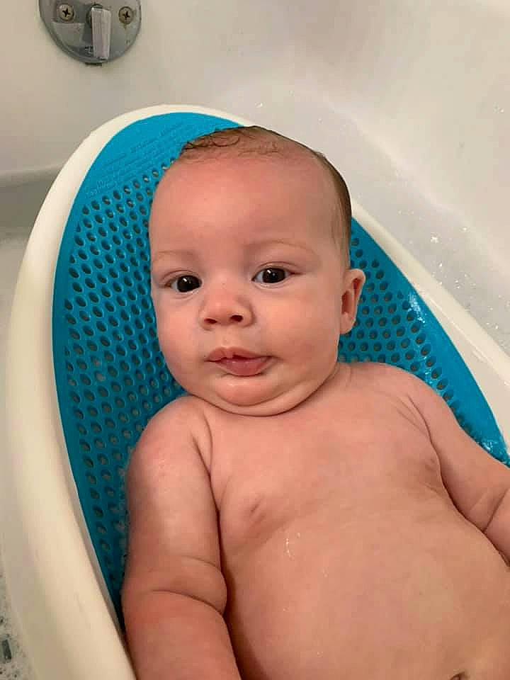 Kasimir is registered to the contest to win money with this photo: baby, baby_bathing, bathing, bathroom, bathtub, blue, cheek, chest, child, finger, fluid, head, organ, person, plumbing_fixture, skin, smile, stomach, thumb, toddler