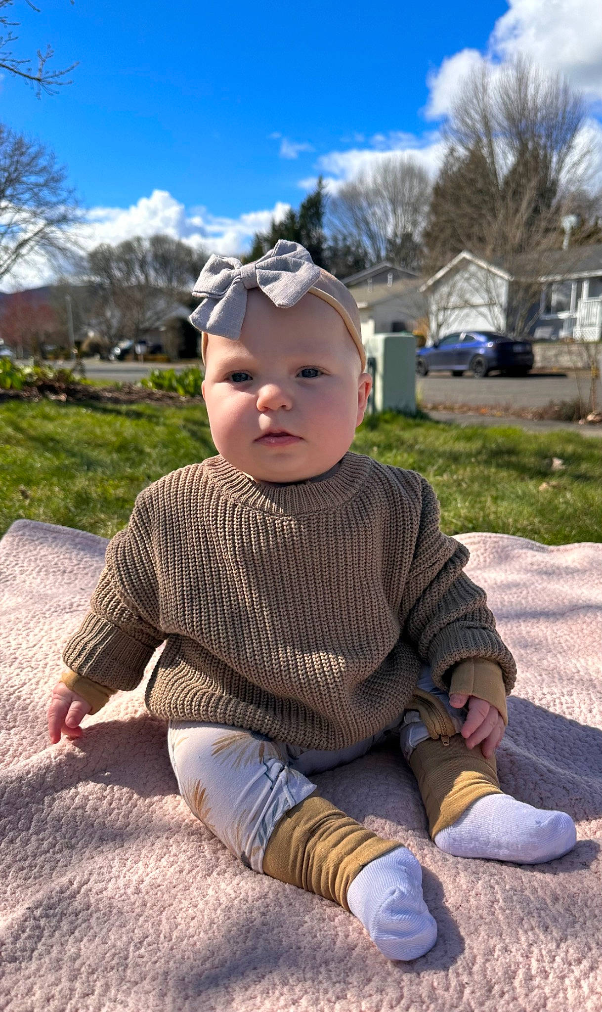 Cedar joined the competition — help win amazing prizes! baby, baby_toddler_clothing, cap, child, cloud, eyewear, fashion_accessory, fun, grass, hat, headwear, leisure, pattern, person, personal_protective_equipment, plant, sitting, sky, sleeve, toddler