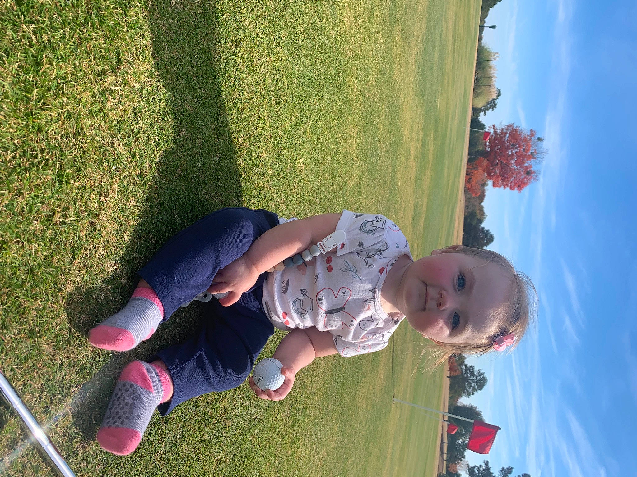 Lilith joined the competition — help win amazing prizes! cool, facial_expression, fun, grass, happy, human_body, leaf, leisure, line, people_in_nature, person, photograph, plant, public_space, recreation, sky, smile, summer, sunlight, toddler