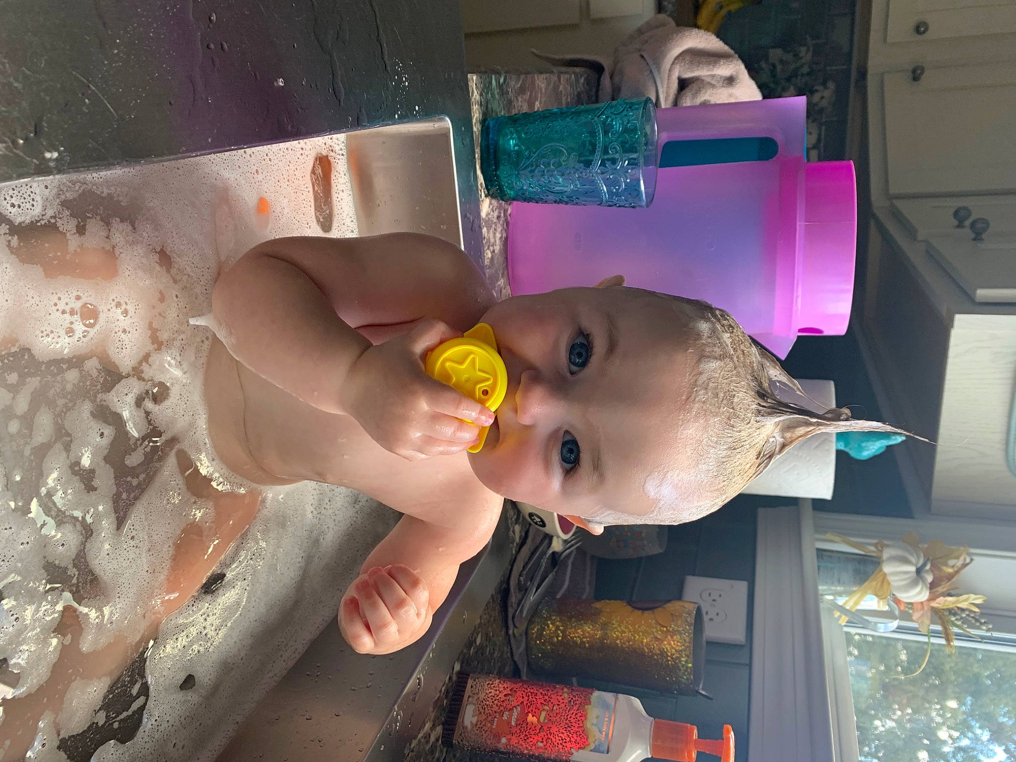 Lilith joined the competition — help win amazing prizes! baby, bathing, child, comfort_food, eyewear, fluid, foam, fun, happy, liquid, liquid_bubble, machine, mouth, person, plastic, plastic_bottle, room, toddler, toy, water