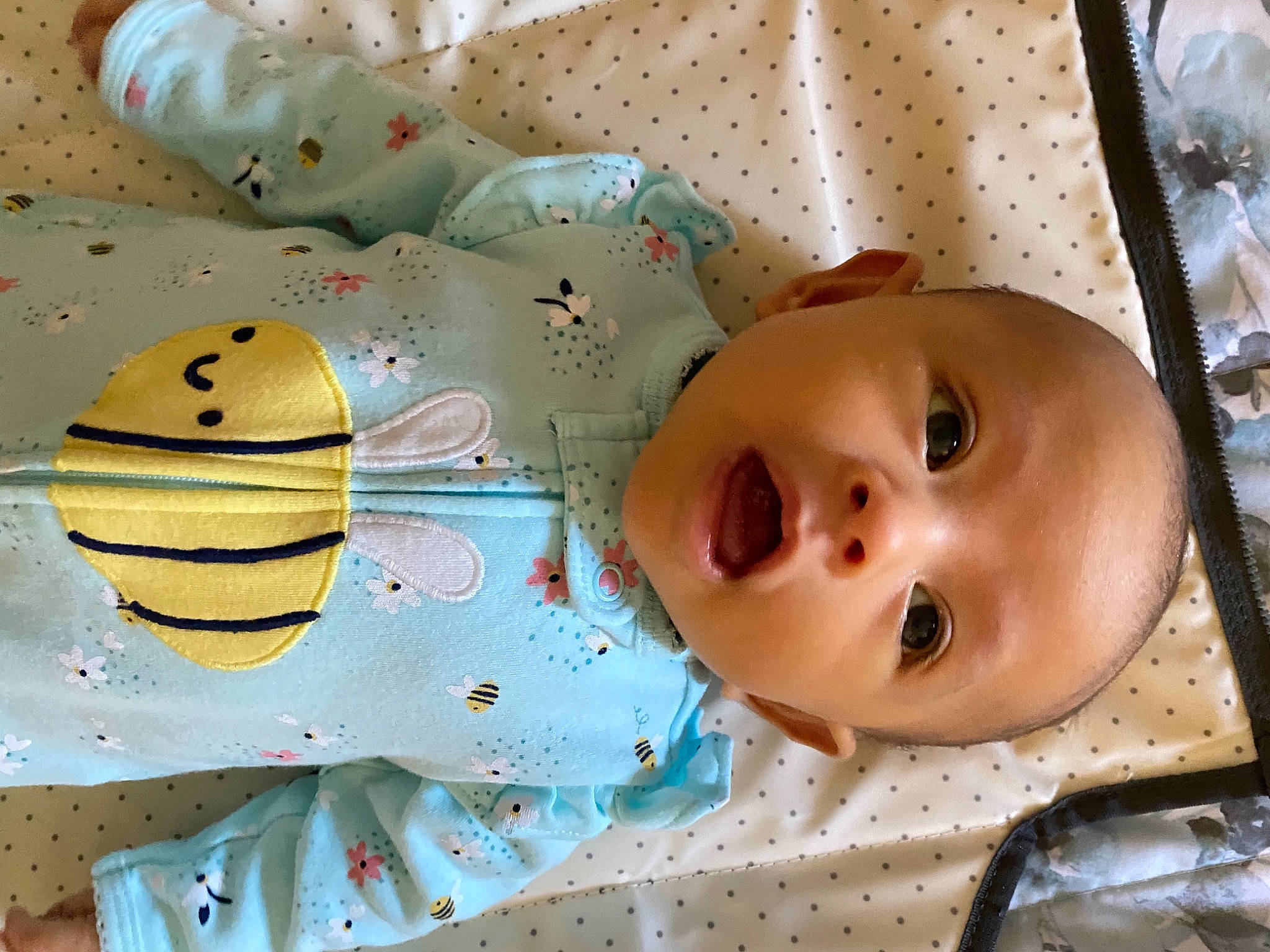 Miya is registered to the contest to win money with this photo: baby, baby_products, baby_safety, baby_toddler_clothing, cheek, child, eyelash, fun, happy, linens, pattern, peach, person, product, room, toddler, white