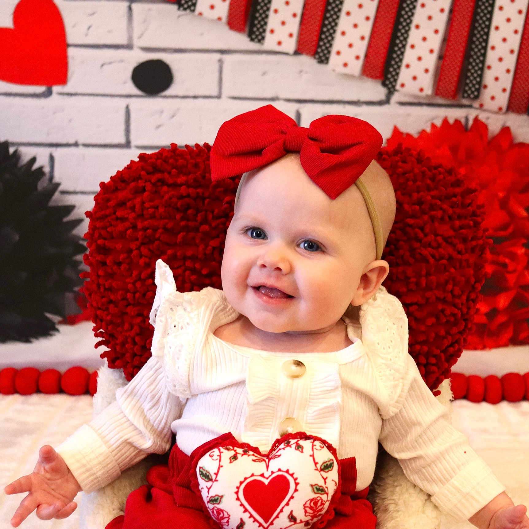 Remington joined the competition — help win amazing prizes! baby, bow_headband, bright_eyes, cheeky_smile, cozy, cute, decorative_backdrop, heart_plush, holiday, infant, photography, polka_dot, portrait, red_bow, red_cushion, sitting, smile, soft_texture, valentines_theme, white_outfit