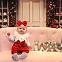 Remington is registered to the contest to win money with this photo: baby, infant, child, red_bow, white_top, red_skirt, pink_couch, sofa, love_sign, illuminated_letters, roses, flowers, cakes, cupcakes, bakery_window, studio_backdrop, portrait, sitting, shoes, valentine_theme