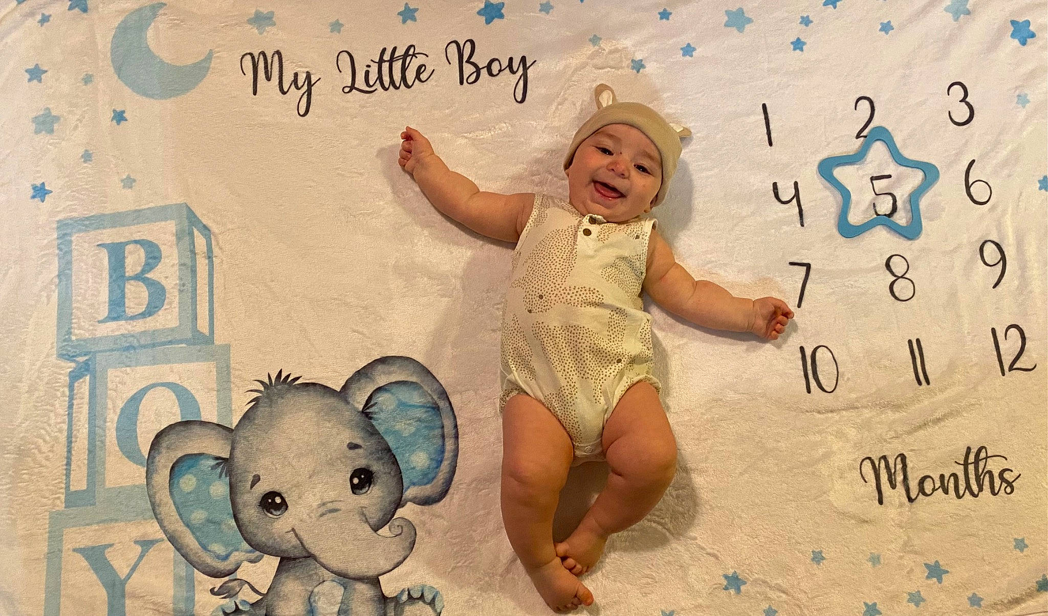 Luciano joined the competition — help win amazing prizes! art, baby_toddler_clothing, barefoot, child, facial_expression, font, foot, fun, gesture, happy, headwear, human_leg, pattern, person, pink, room, skin, smile, thigh, thumb