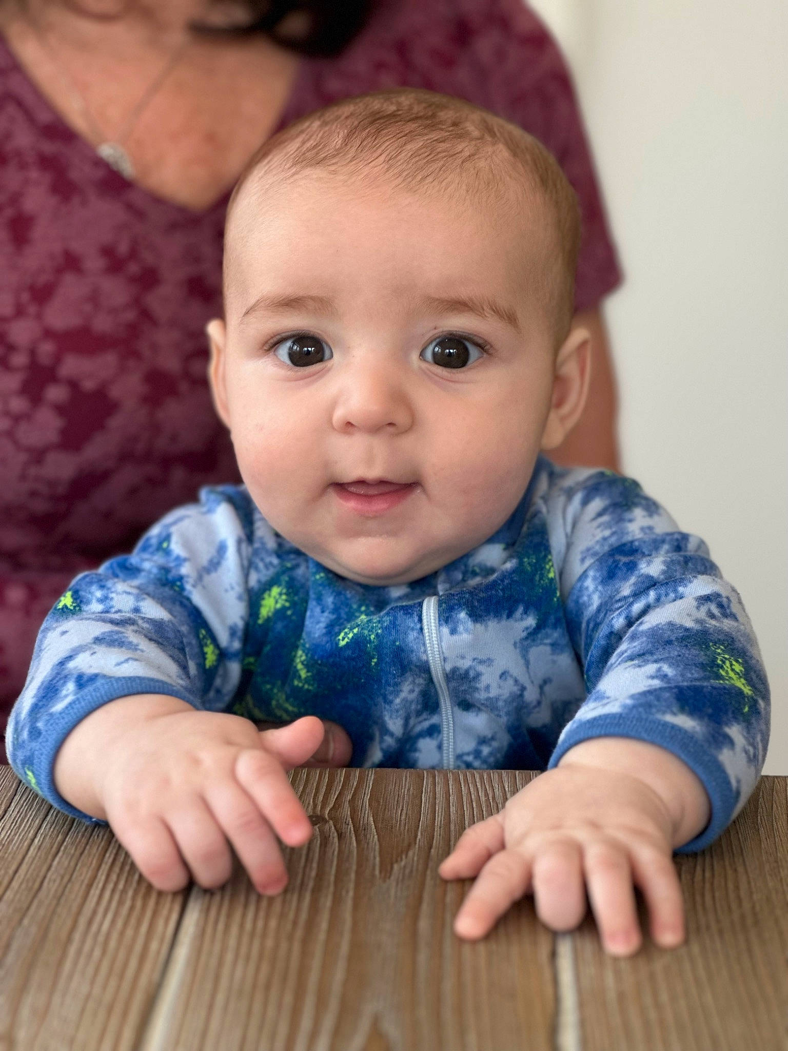 Luciano is registered to the contest to win money with this photo: arm, baby, baby_toddler_clothing, cheek, chin, eye, face, finger, hand, happy, head, iris, lip, nose, organ, person, product, skin, sleeve, standing