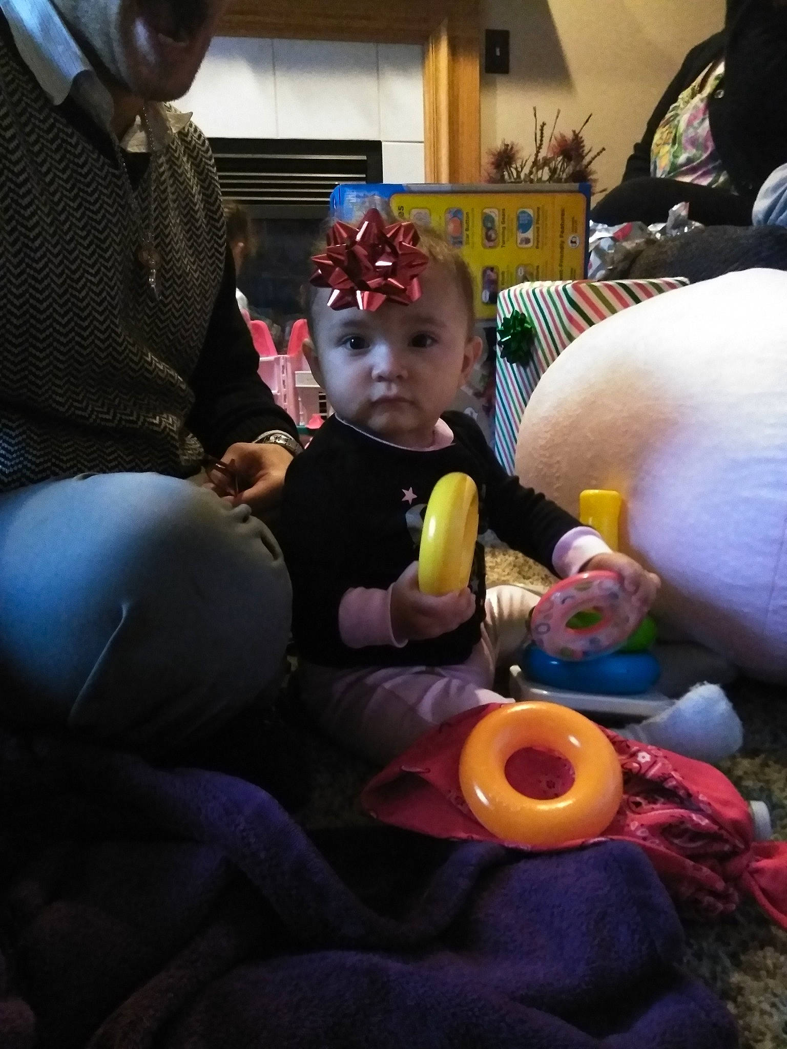 Jodi is registered to the contest to win money with this photo: child, fun, girl, headwear, infant, person, play, recreation, toddler, toy