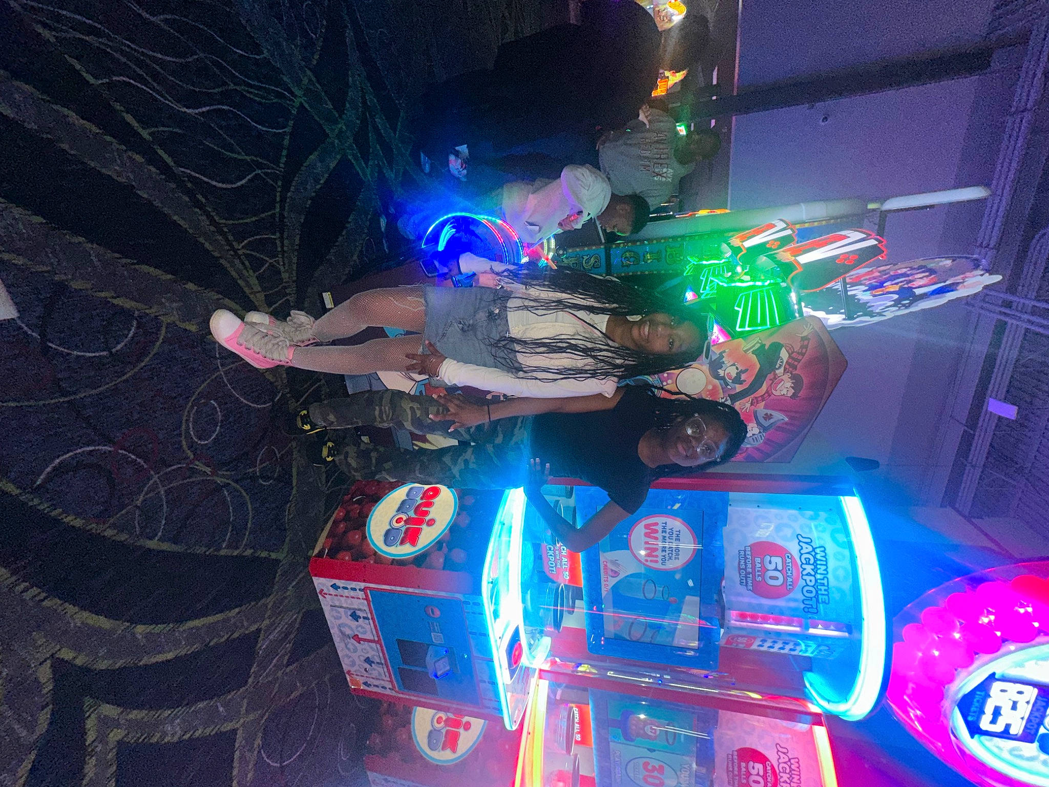 Milan joined the competition — help win amazing prizes! automotive_lighting, bumper, electric_blue, electronics, entertainment, event, fun, games, headlamp, joy, machine, magenta, night, person, recreation, room, space, technology, toy, visual_effect_lighting