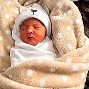 Jaedyn joined the competition — help win amazing prizes! newborn, baby, sleeping, blanket, soft, polka_dot, hat, bear_ears, cute, wrapped, cozy, infant, child, face, skin, indoors, bed, resting, warm, comfort