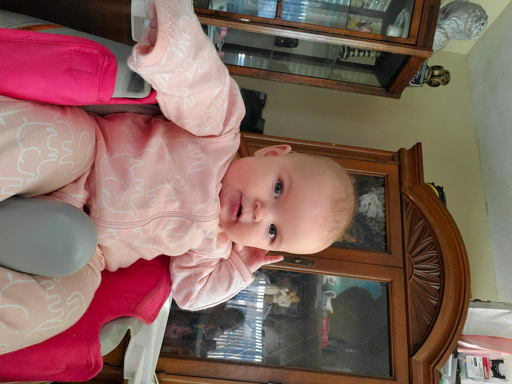 Paisley is registered to the contest to win money with this photo: baby, baby_products, baby_safety, baby_toddler_clothing, cheek, child, fun, hardwood, mouth, organ, person, picture_frame, product, room, shelf, sitting, skin, smile, thumb, toddler