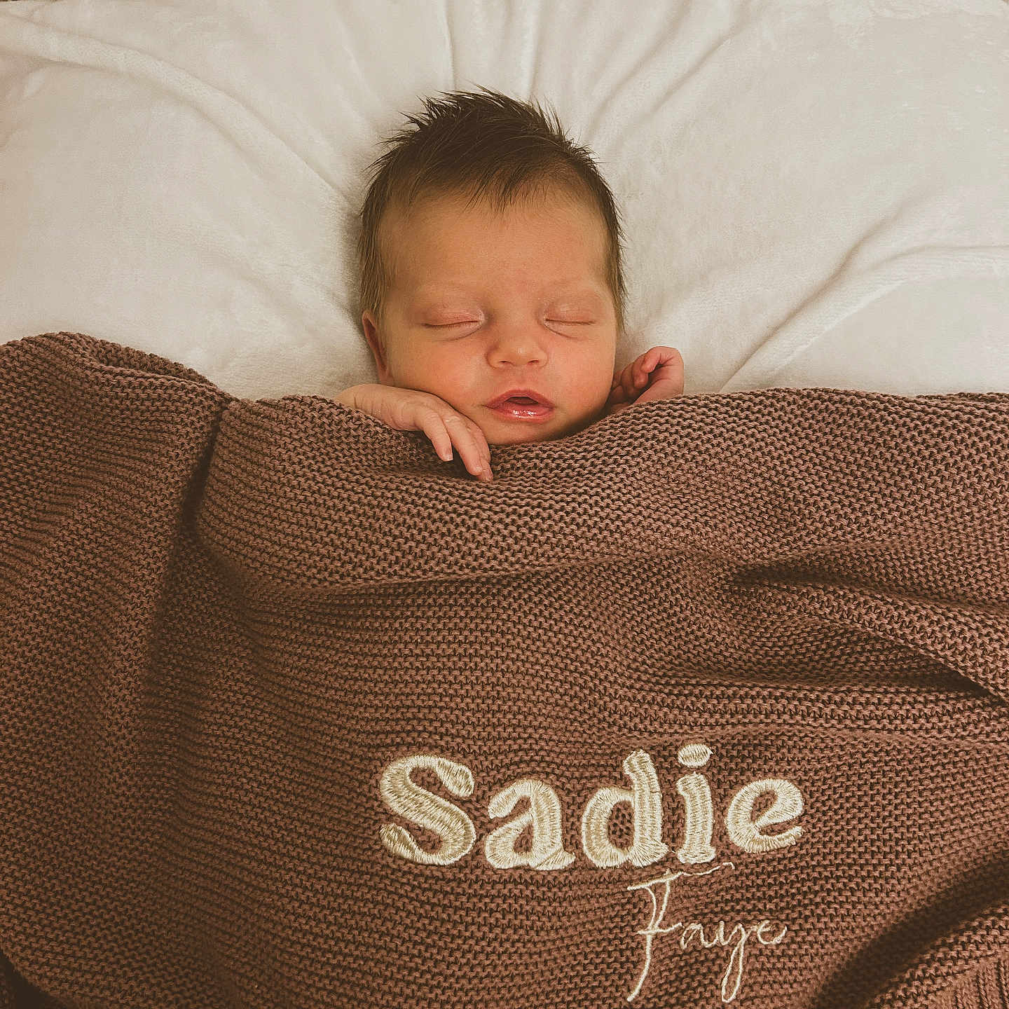Sadie Faye joined the competition — help win amazing prizes! newborn, baby, sleeping, blanket, knitted, brown, white, cushion, face, peaceful, infant, portrait, cozy, child, soft, resting, indoors, cute, young, wrapped