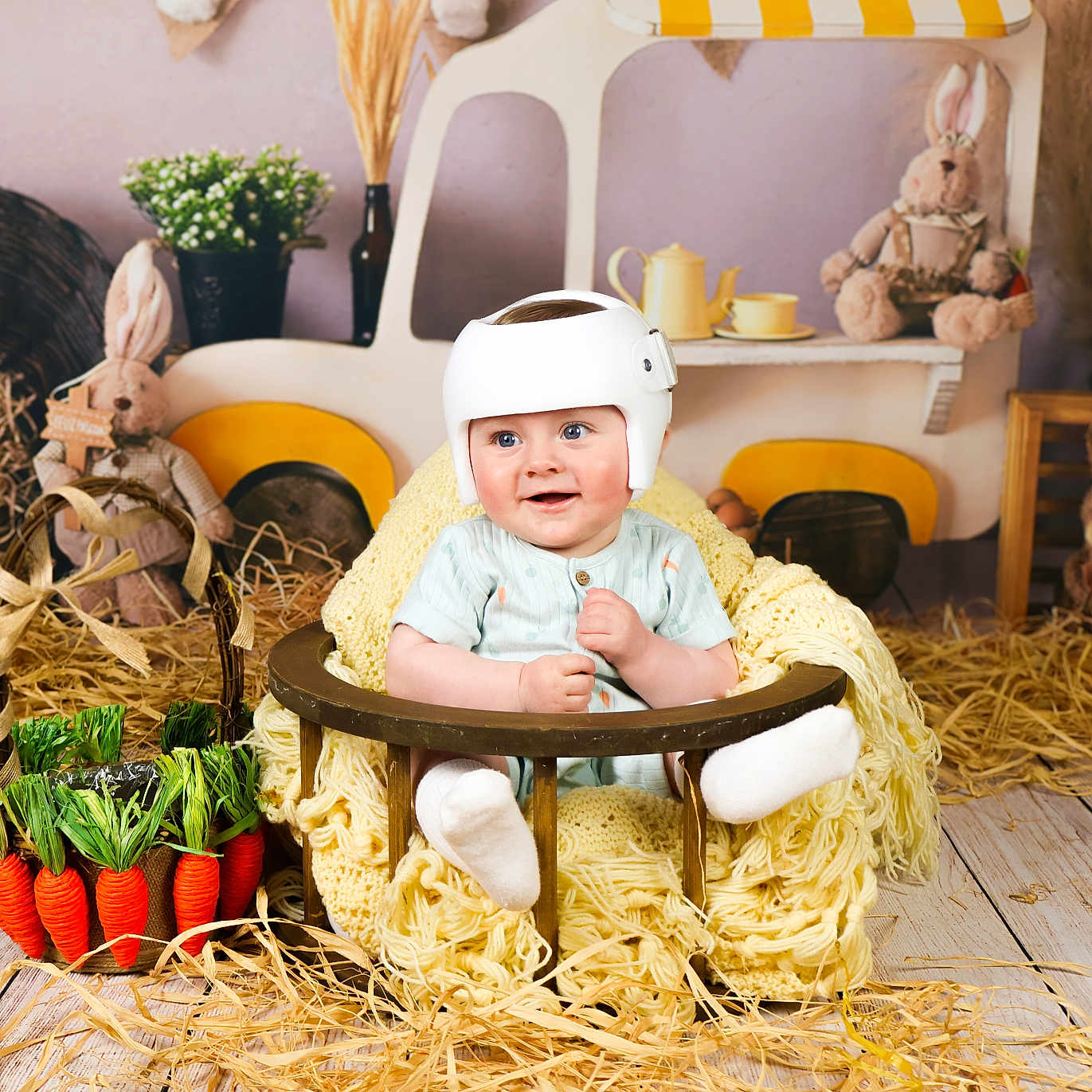 Finn is registered to the contest to win money with this photo: baby, clothing, cup, face, furniture, happy, hat, head, helmet, jar, person, photography, plant, planter, portrait, pottedplant, pottery, sitting, vase, wood