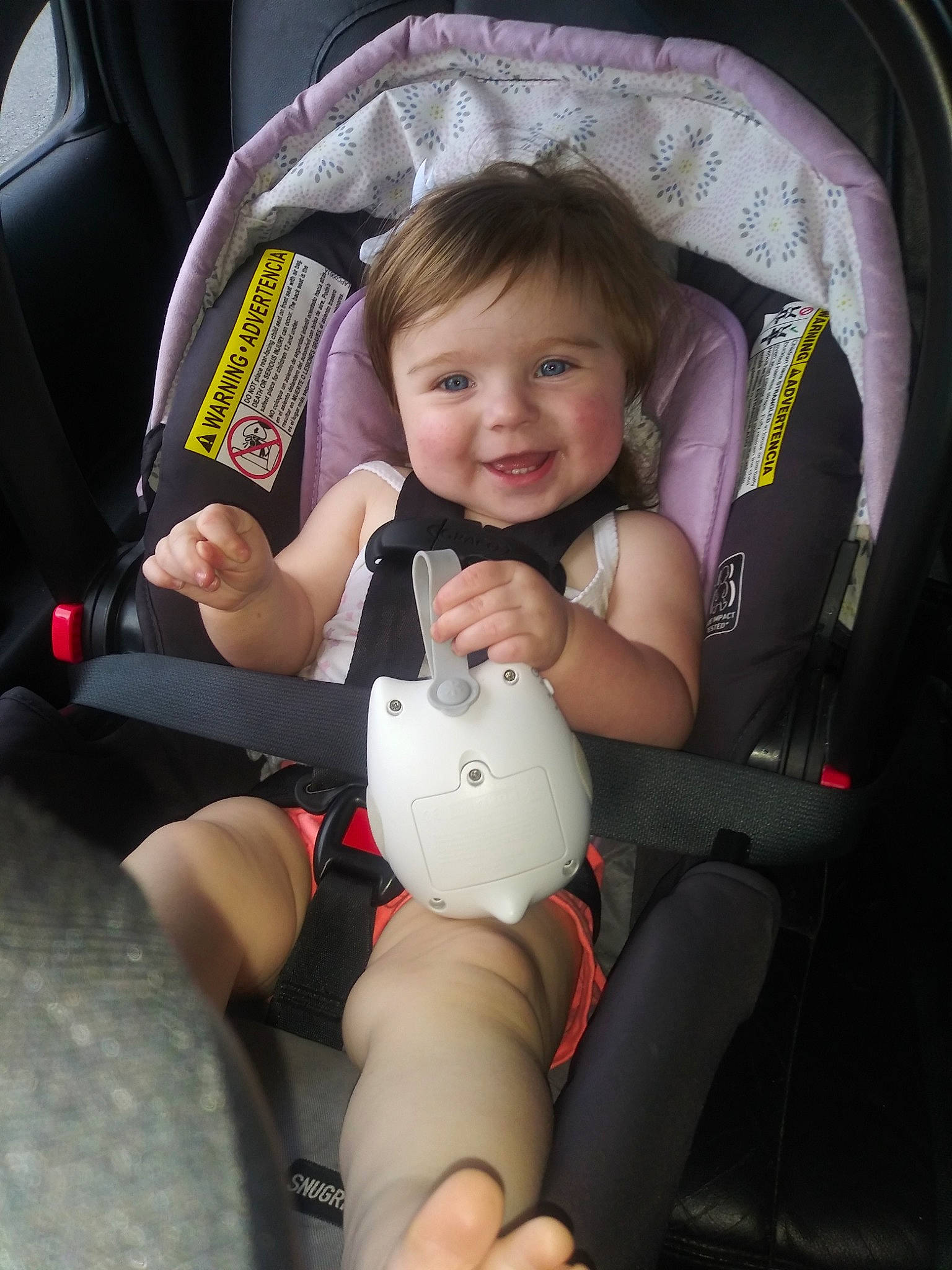 Journie is registered to the contest to win money with this photo: auto_part, baby, baby_carriage, baby_in_car_seat, baby_products, car_seat, car_seat_cover, child, joy, person, product, seat_belt, sitting, skin, toddler, vacation
