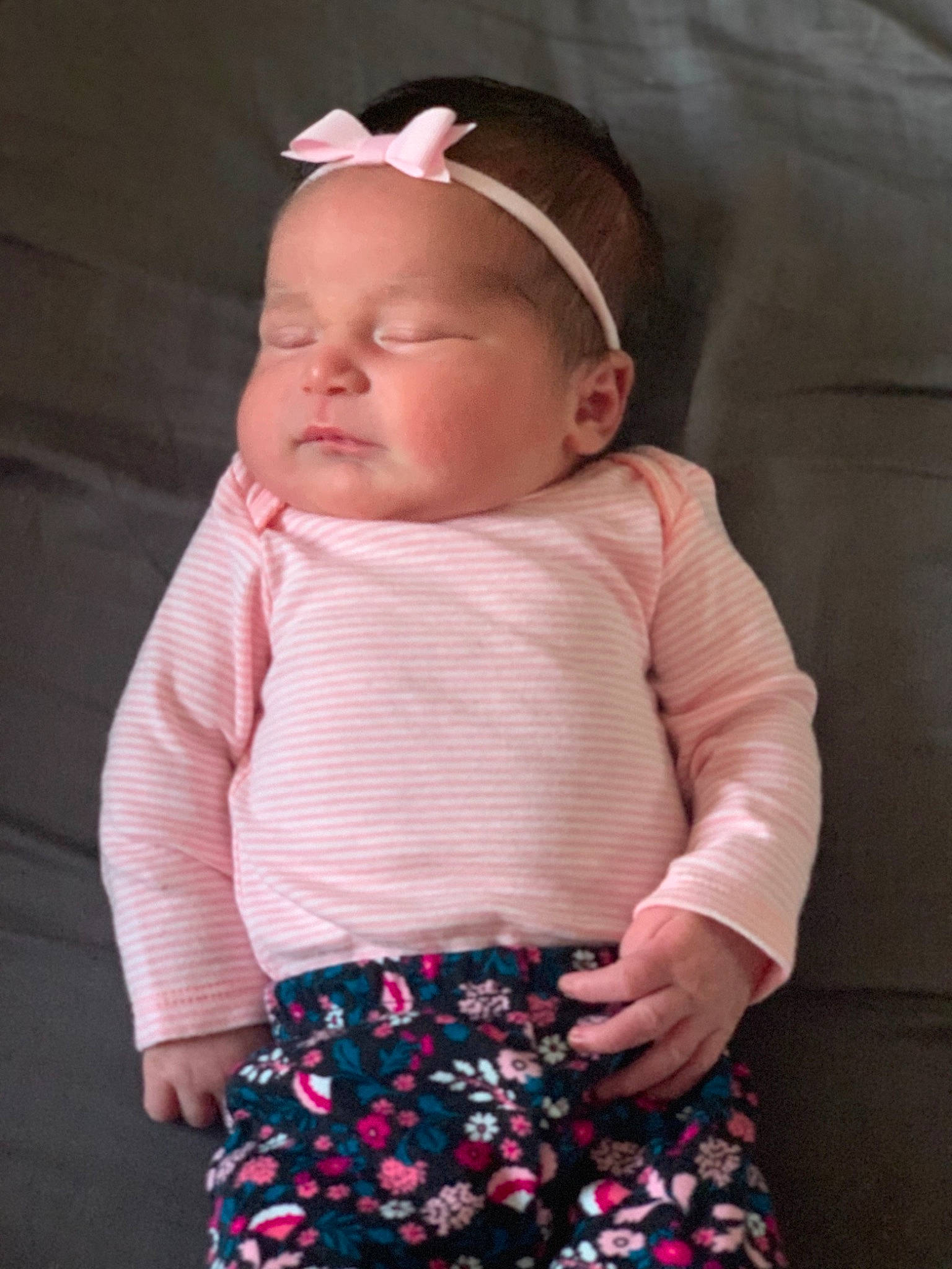 Alayzia joined the competition — help win amazing prizes! arm, baby, baby_toddler_clothing, cap, eye, face, facial_expression, head, human_body, leg, lip, neck, organ, outerwear, person, pink, skin, sleeve, standing, textile