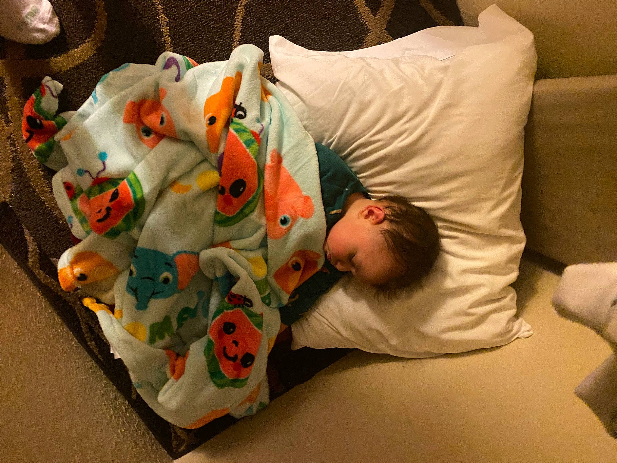 Dominik is registered to the contest to win money with this photo: arm, baby, baby_products, baby_sleeping, baby_toddler_clothing, bed_sheet, bedding, bedtime, carmine, child, comfort, flooring, linens, nap, person, room, sitting, toddler