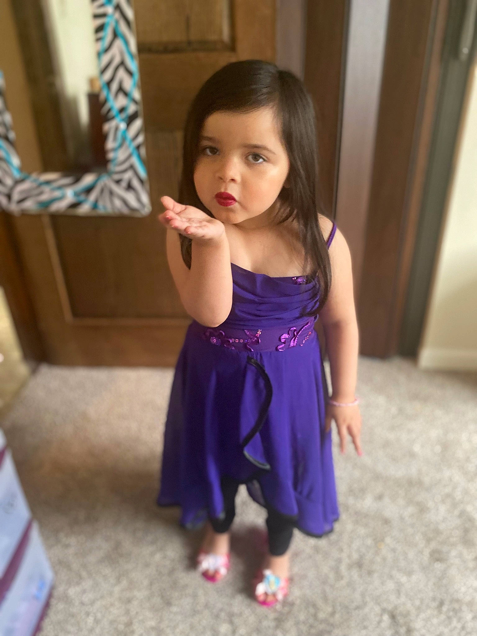 Kaia is registered to the contest to win money with this photo: abdomen, baby_toddler_clothing, child, electric_blue, event, flooring, formal_wear, fun, happy, human_leg, magenta, pattern, person, play, sitting, sleeve, toddler, trunk, vacation, waist