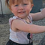 backyard, black_skirt, blue_eyes, child, cute, daylight, garden, happy, necklace, outdoor, person, pigtails, play, red_hair, sleeveless_top, smiling, summer_clothing, toddler, wicker_chair, young_child