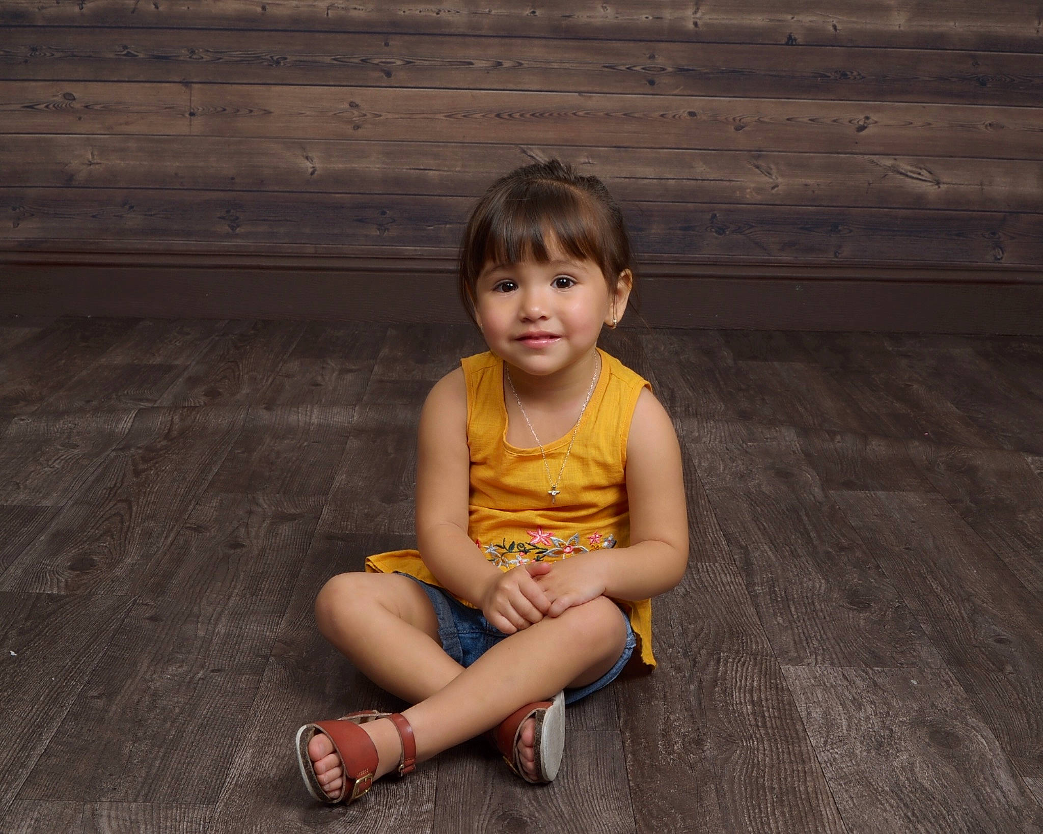 Jewel is registered to the contest to win money with this photo: child, child_model, finger, floor, flooring, hairstyle, hardwood, leg, person, photograph, photography, play, sitting, skin, smile, snapshot, standing, toddler, wood, wood_flooring