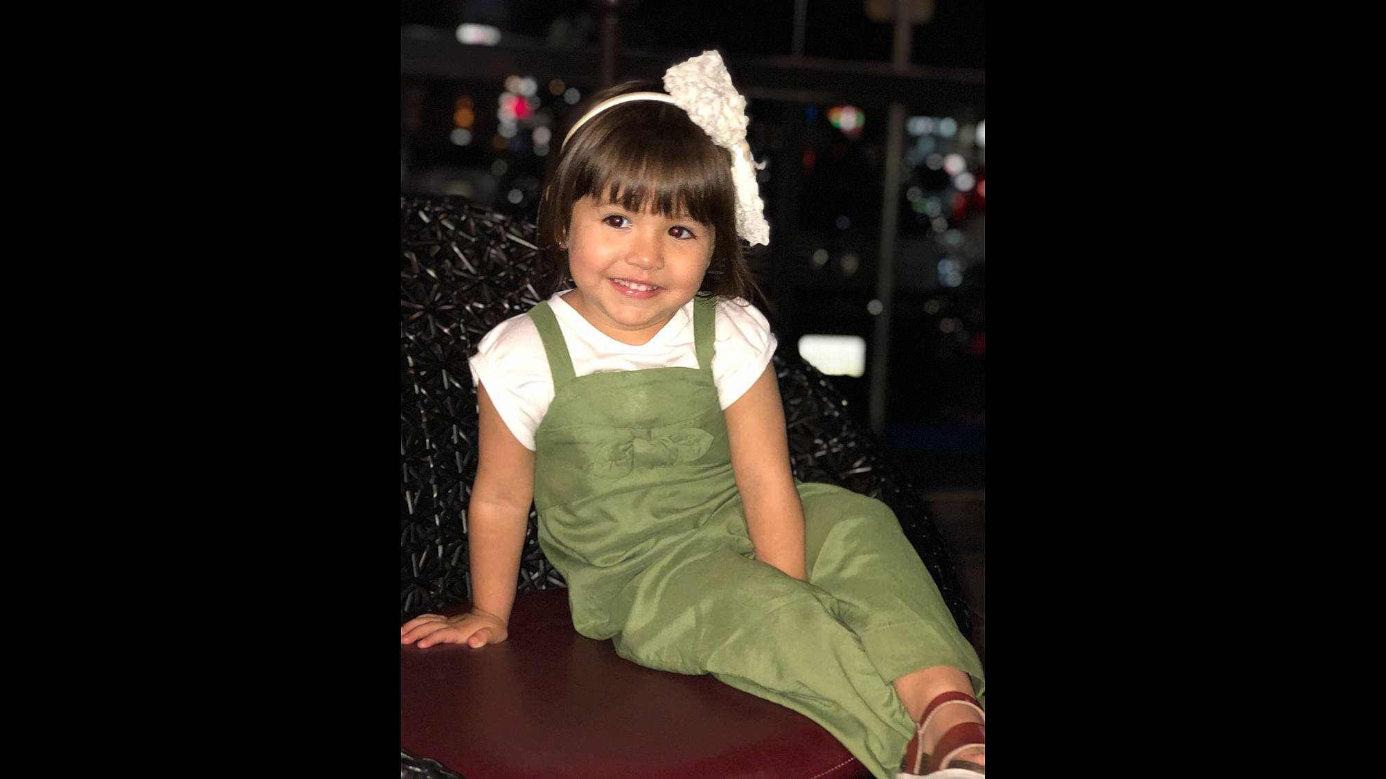 Jewel joined the competition — help win amazing prizes! arm, black_hair, cheek, child, child_model, flash_photography, fun, hairstyle, head, human, human_body, joy, leg, person, photography, sitting, smile, snapshot, toddler